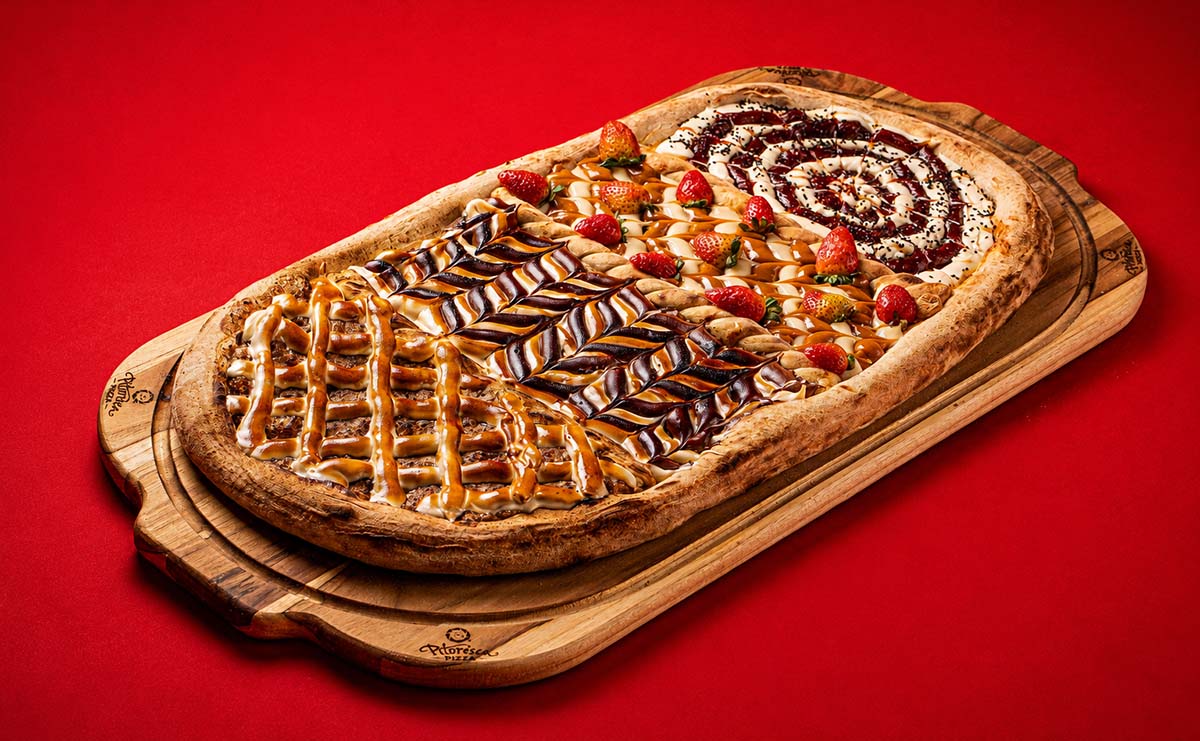 Com quase um metro, versão gigante promete chamar a atenção no Dia Mundial da Pizza Com quase um metro, versão gigante promete chamar a atenção no Dia Mundial da Pizza
